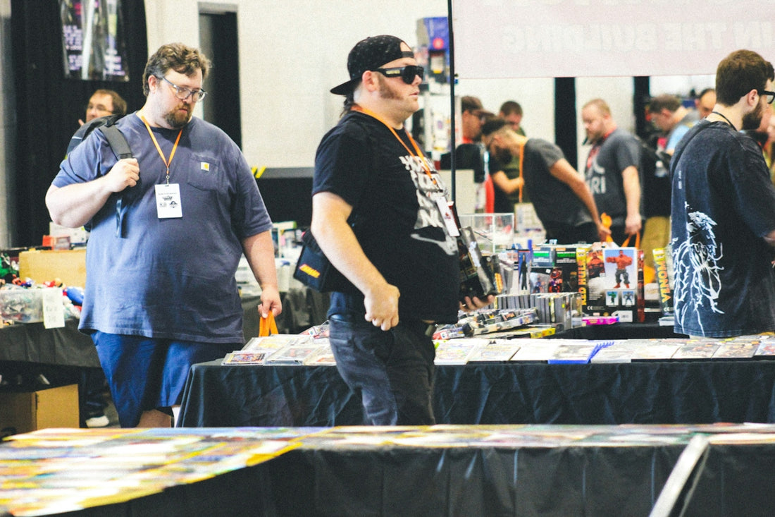 People browse merchandise at an indoor convention or market